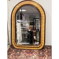 Miroir encadrement doré et moucheté de c