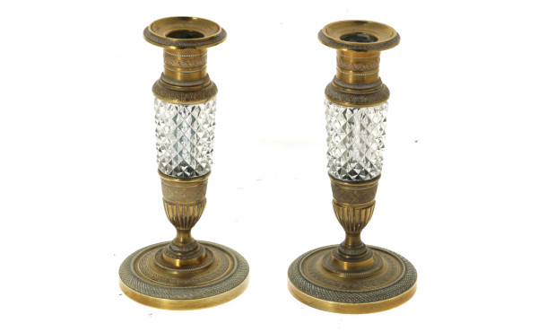 Paire de bougeoirs en bronze doré à déco