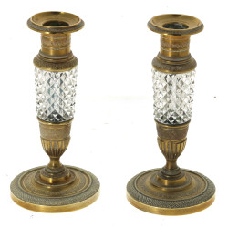 Paire de bougeoirs en bronze doré à déco