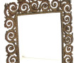 Miroir en bronze à décor de rinceaux et 