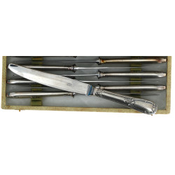 12 couteaux de table en métal argenté dé