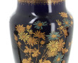 Vase à décor floral bleu, blanc et or su