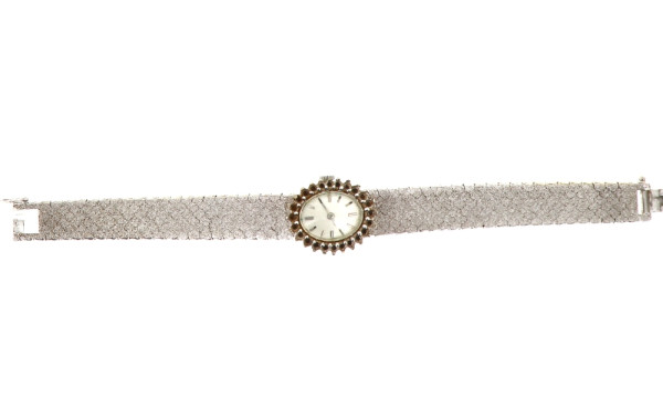 Montre bracelet de dame en or gris poinç