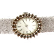 Montre bracelet de dame en or gris poinç
