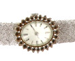 Montre bracelet de dame en or gris poinç