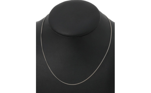 Chaîne en or gris 18 cts, poinçon tête d