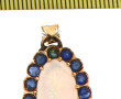 Pendentif ovale en or 14 cts, serti d'un