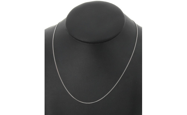 Chaîne en or gris 18 cts, poinçon tête d