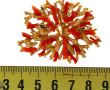 Broche-pendentif style couture en métal 