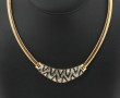 SWAROVSKI - Parure en métal doré, strass