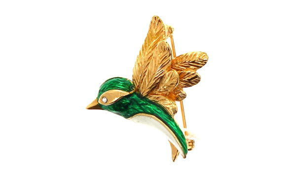 CARVEN - Broche oiseau en métal doré et 