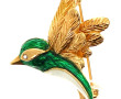 CARVEN - Broche oiseau en métal doré et 