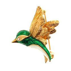 CARVEN - Broche oiseau en métal doré et 