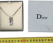 DIOR - Pendentif en métal sur chaîne mét