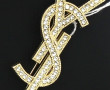 YVES SAINT-LAURENT - Broche YSL en métal