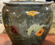 Important cache-pot en céramique à décor