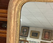 Miroir fin XIXème en bois et stuc doré, 