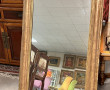 Miroir fin XIXème en bois et stuc doré, 