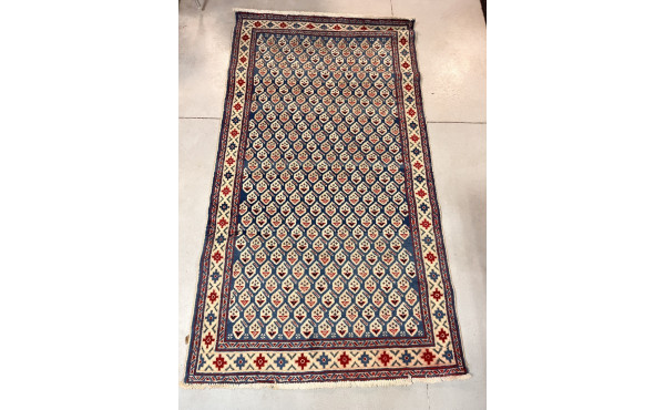 Tapis en laine points noués dans les ton