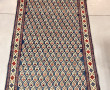 Tapis en laine points noués dans les ton