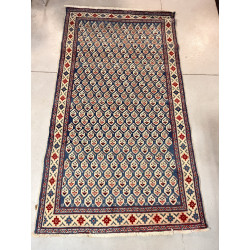 Tapis en laine points noués dans les ton