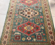 Tapis en laine points noués dans les ton
