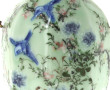 Vase en porcelaine à décor d'oiseaux et 