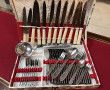Ménagère en inox comprenant 12 couverts,