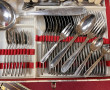 Ménagère en inox comprenant 12 couverts,