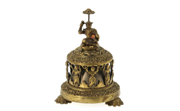 Clochette de table en bronze à décor de 