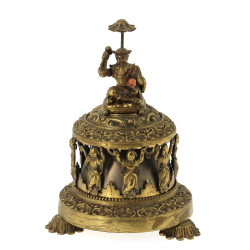 Clochette de table en bronze à décor de 