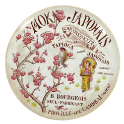 Plat rond en faïence publicitaire début 