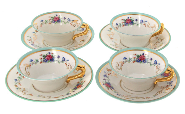 4 tasses et 4 sous-tasses en porcelaine 
