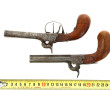 Lot de deux pistolets coup de poing à pe