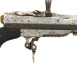 Pistolet à percussion (élément de canne 