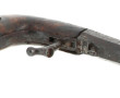 Pistolet à percussion par le dessous sys