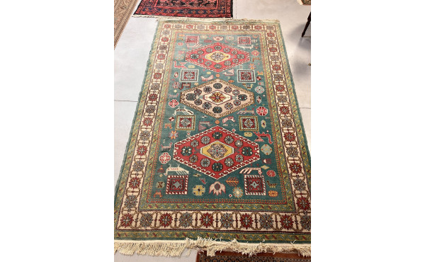 Tapis en laine points noués dans les ton