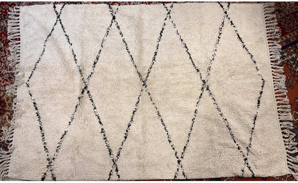 2 descentes de lit et un tapis en laine 