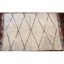 2 descentes de lit et un tapis en laine 