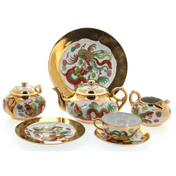 Service à thé en porcelaine blanche et o