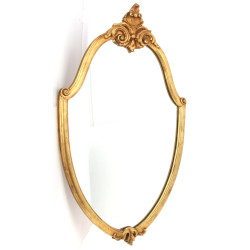 Grand miroir ovale de style rocaille, en