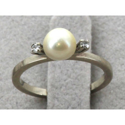 Bague en or gris 18 cts, poinçon tête d'