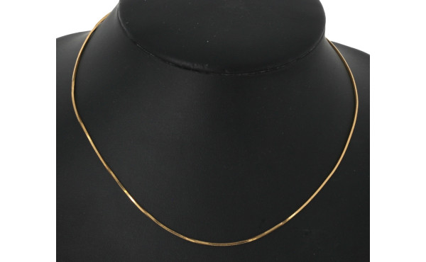 Chaîne en or jaune 18 cts, poinçon tête 