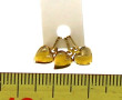 Trois petits pendentifs "cœur" en or jau