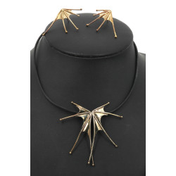 Parure moderniste en métal comprenant un