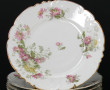Service de table ancien en porcelaine à 