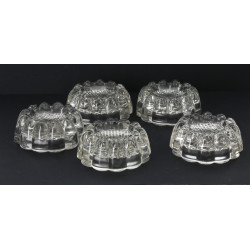 Cinq pieds de piano en verre moulé