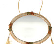 Petit miroir de forme ovale dans le goût