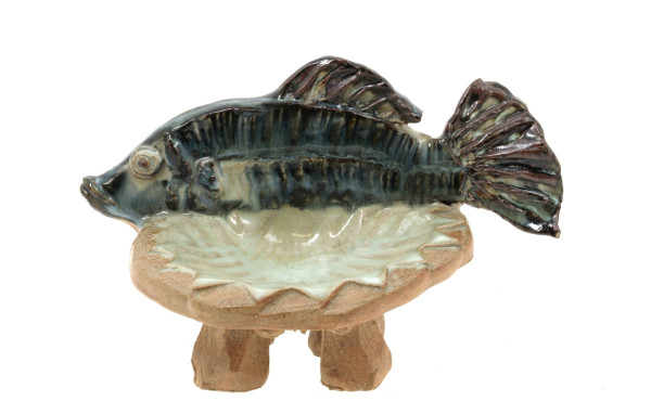 Porte-savon en céramique reposant sur 4 