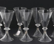 7 verres à pied anciens en verre de form